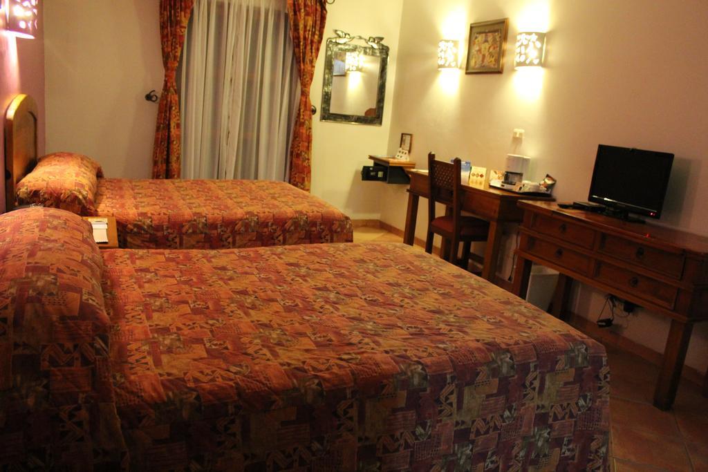 Hotel Casa Conzatti Oaxaca Стая снимка